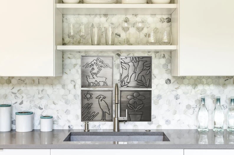 Handmade metal tiles with nature motif