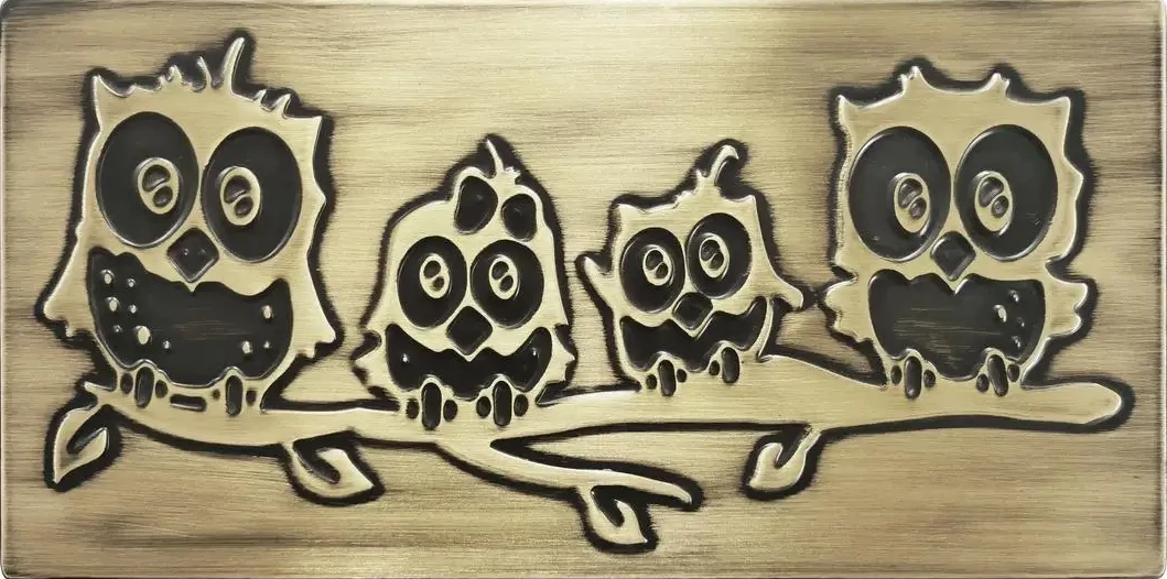Family of owls on a branch brass version