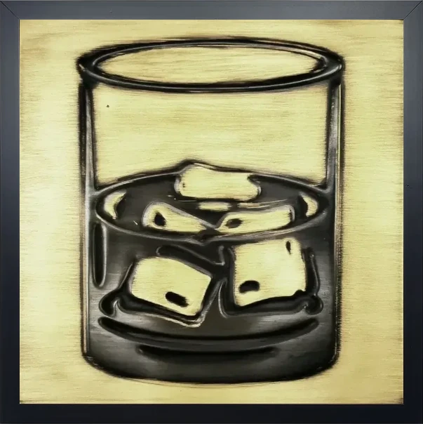 A glass of whiskey on brass tile in wooden frame