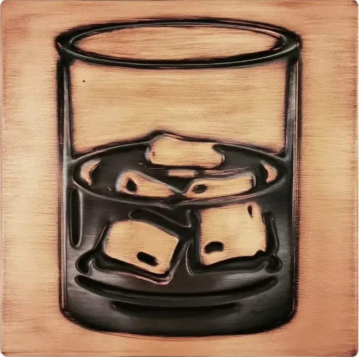 A glass of whiskey on metal tile
