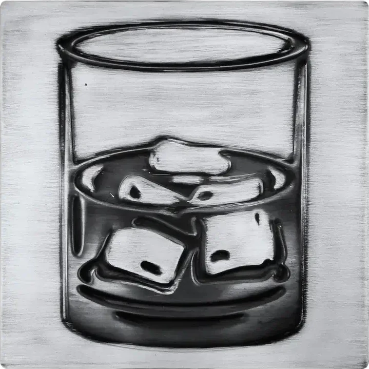 A glass of whiskey on stainless steel tile