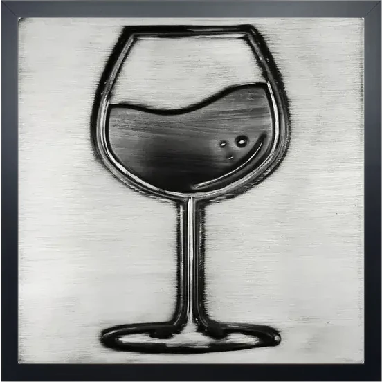 A glass of wine on steel tile in wooden frame