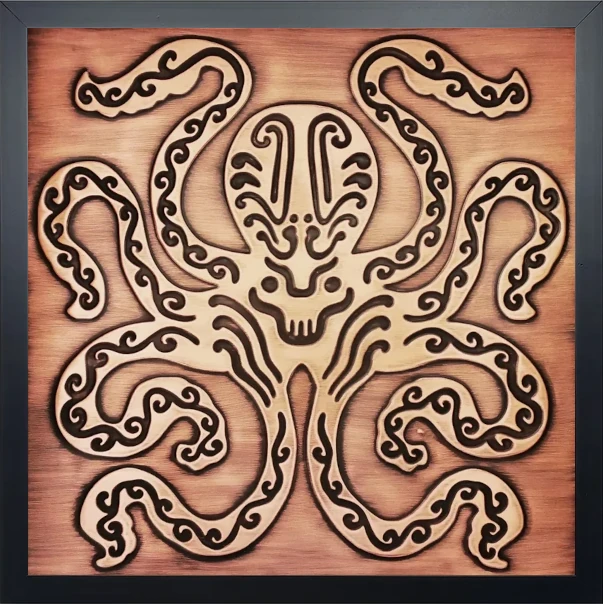 copper tile with Octopus motif in wooden frame