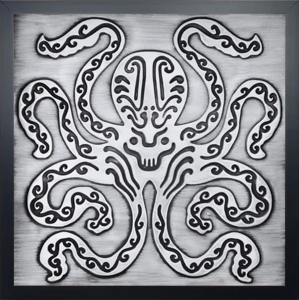 steel tile with Octopus motif in wooden frame