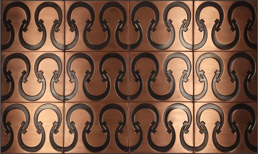 Metal wall tiles with horseshoe pattern copper version